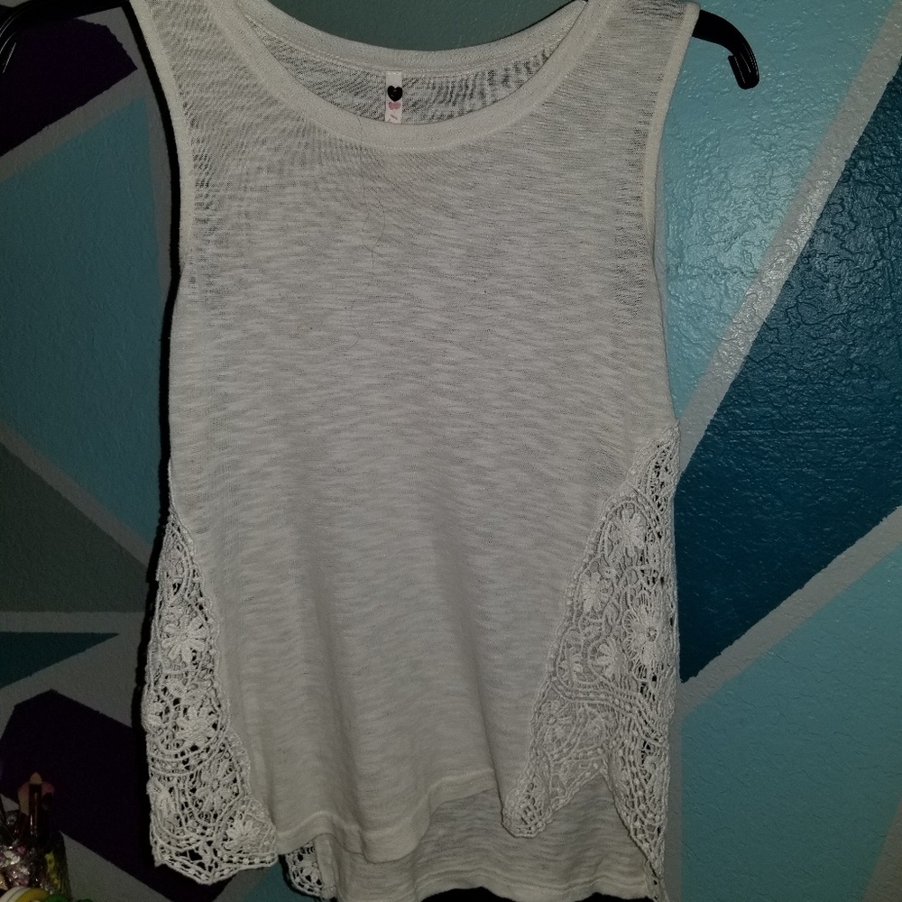 A white lacy tank top